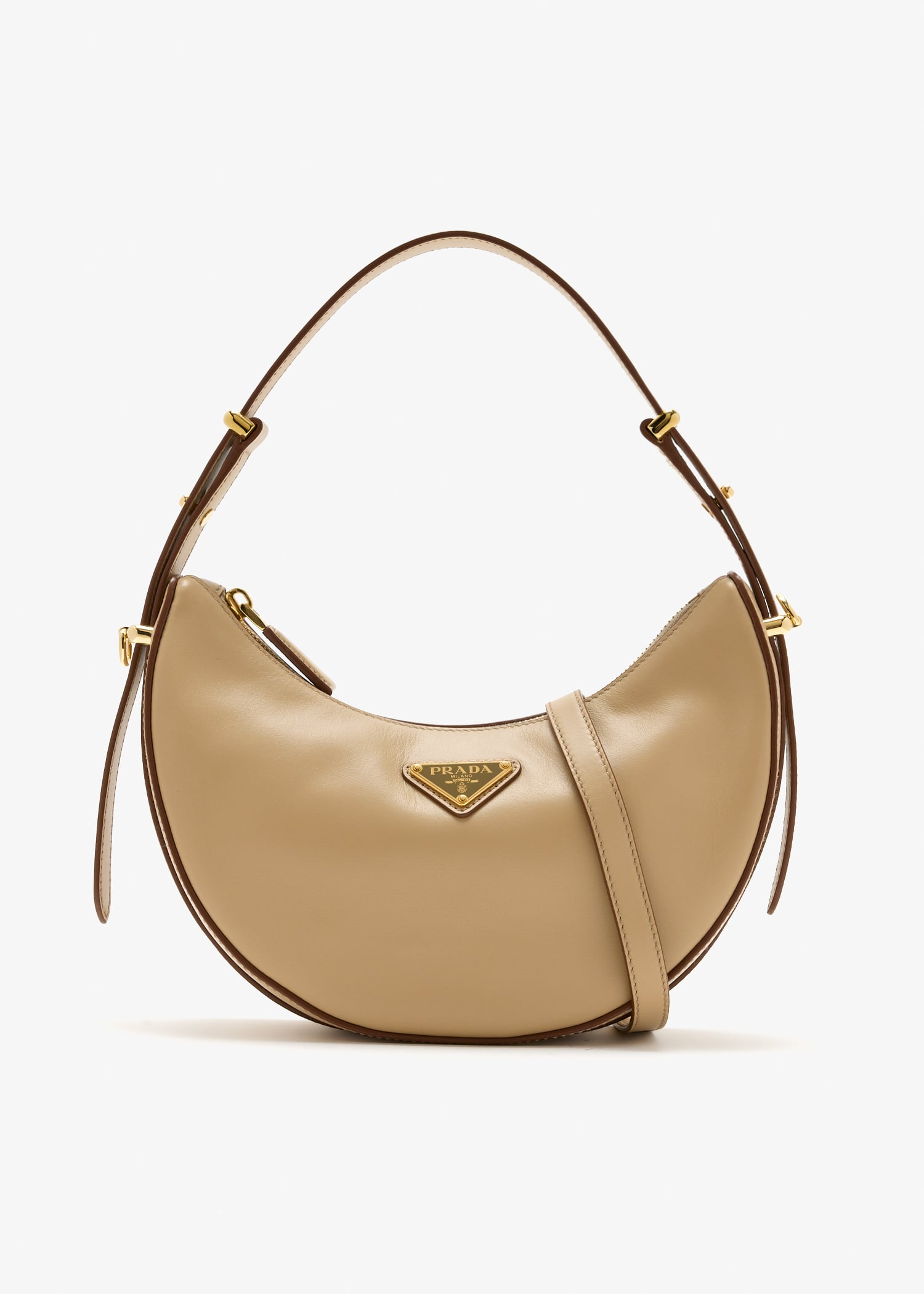 Prada Arqué mini leather shoulder bag, Beige
Prada Arqué mini leather shoulder bag, Beige