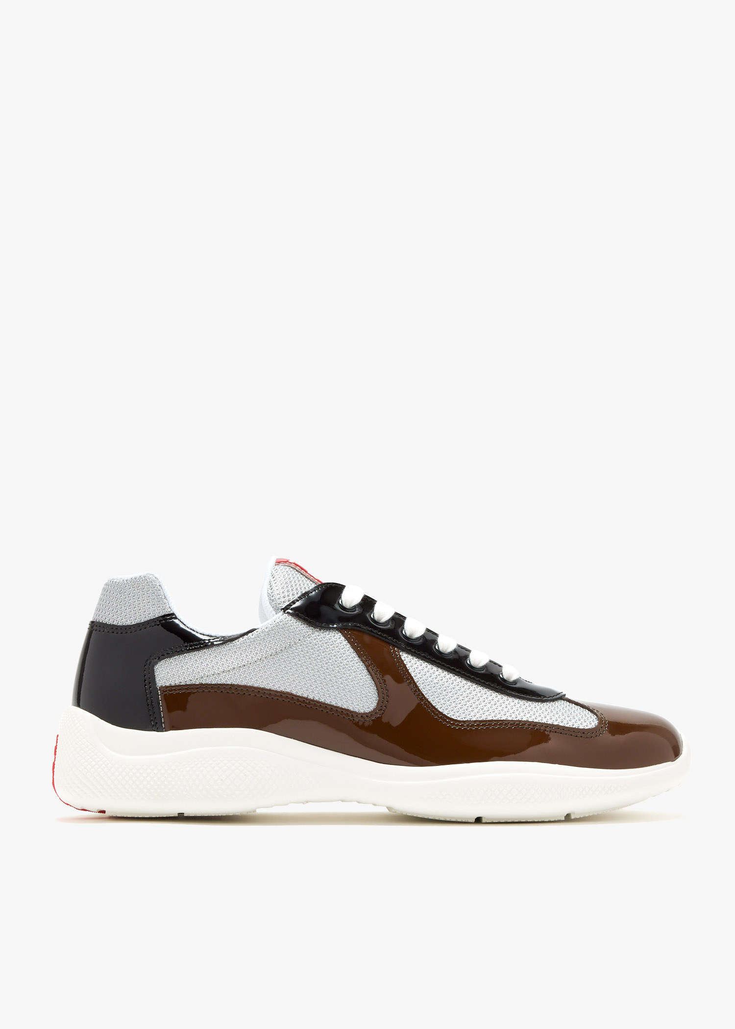 Patent leather and technical fabric Prada America's Cup sneakers, Brown
Patent leather and technical fabric Prada America's Cup sneakers, Brown