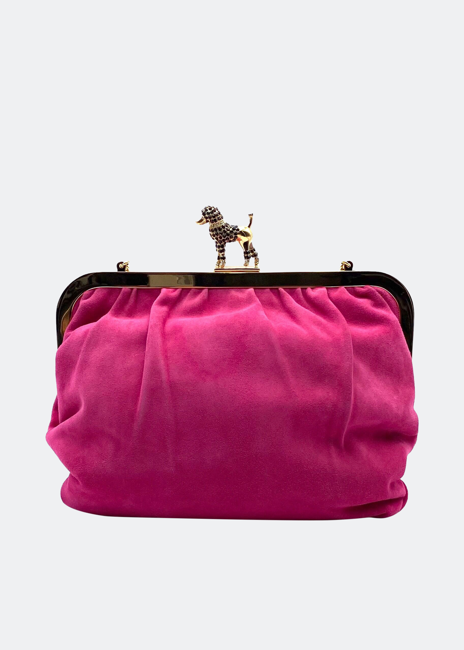 Dolce & Gabbana shoulder bag in pink suede with crystal encrusted Poodle dog clasp
Dolce & Gabbana shoulder bag in pink suede with crystal encrusted Poodle dog clasp