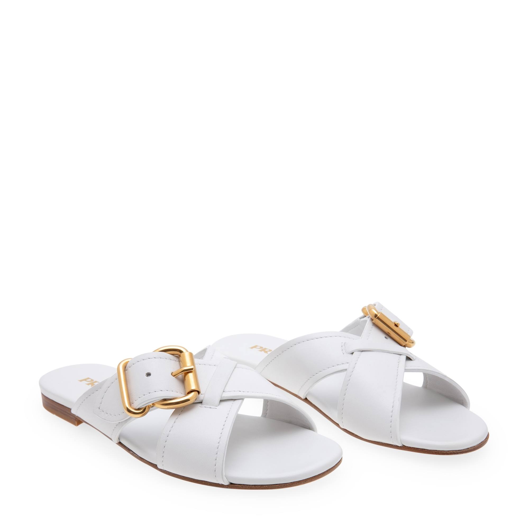 

Buckled cross-over leather slides, White