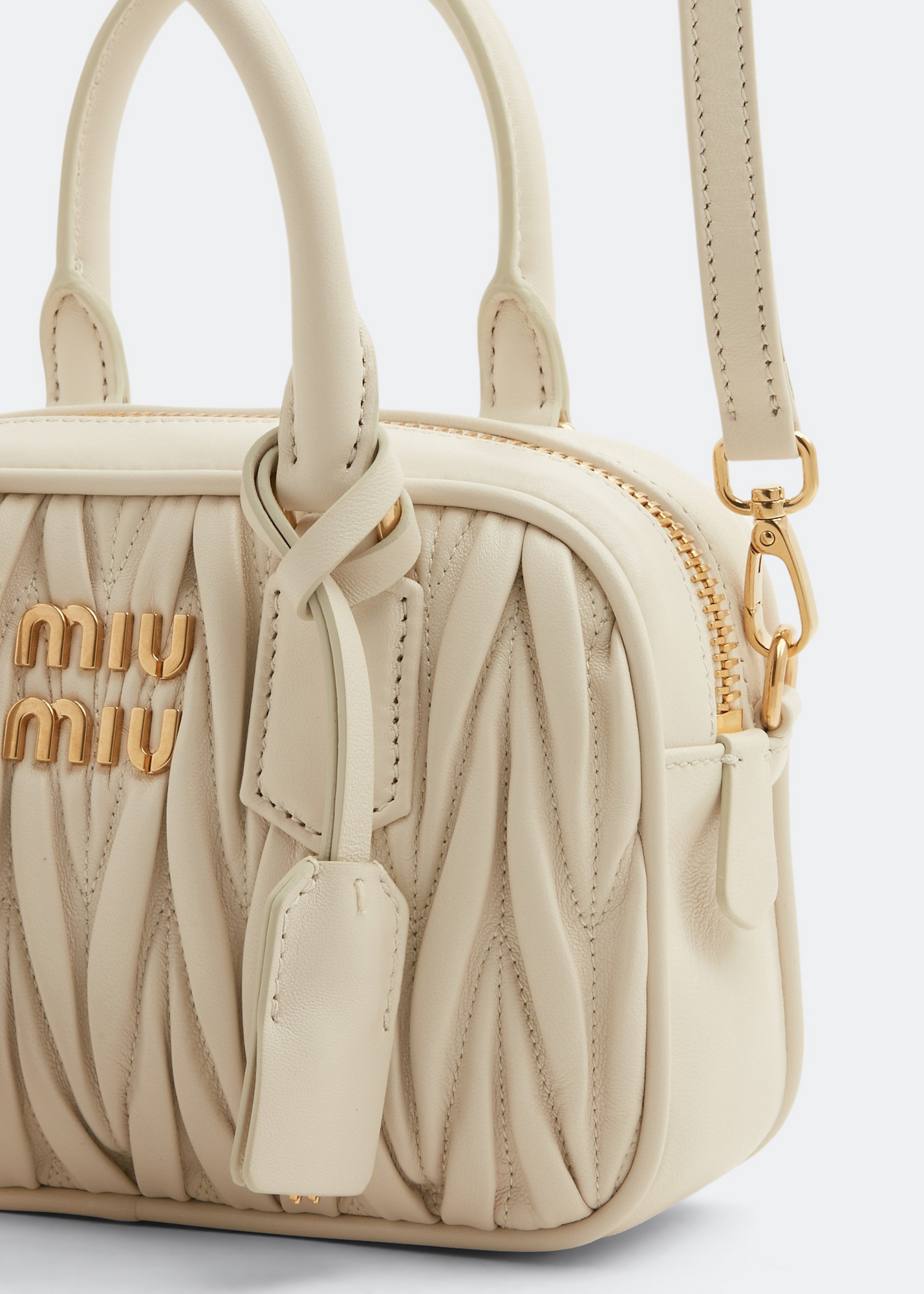 

Matelassé leather top handle bag, White