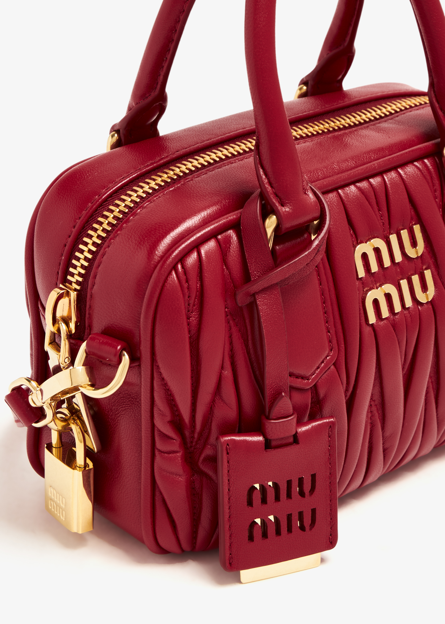 

Matelassé leather top-handle bag, Red