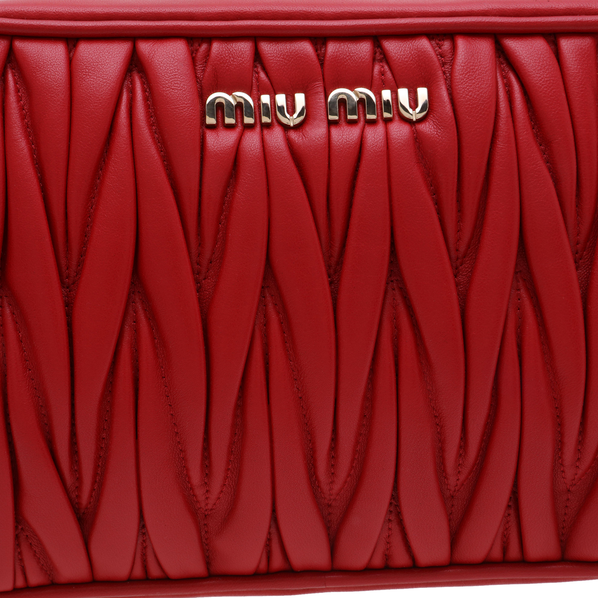 

Matelassé leather top-handle bag, Red