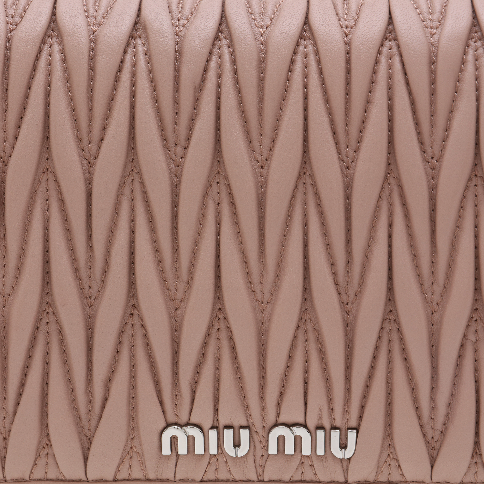 

Délice Miu matelassé leather bag, Beige