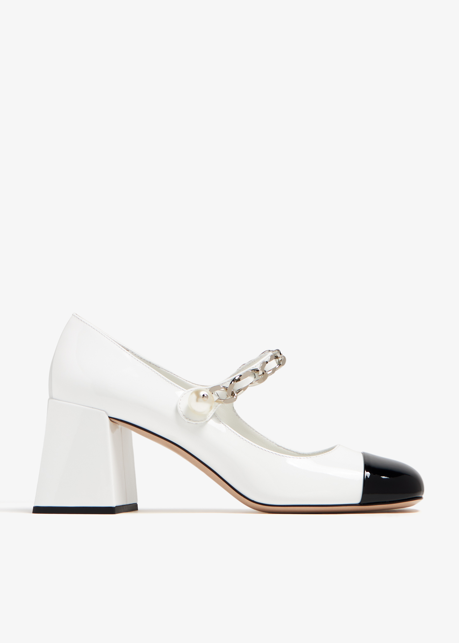 

Patent leather pumps, White