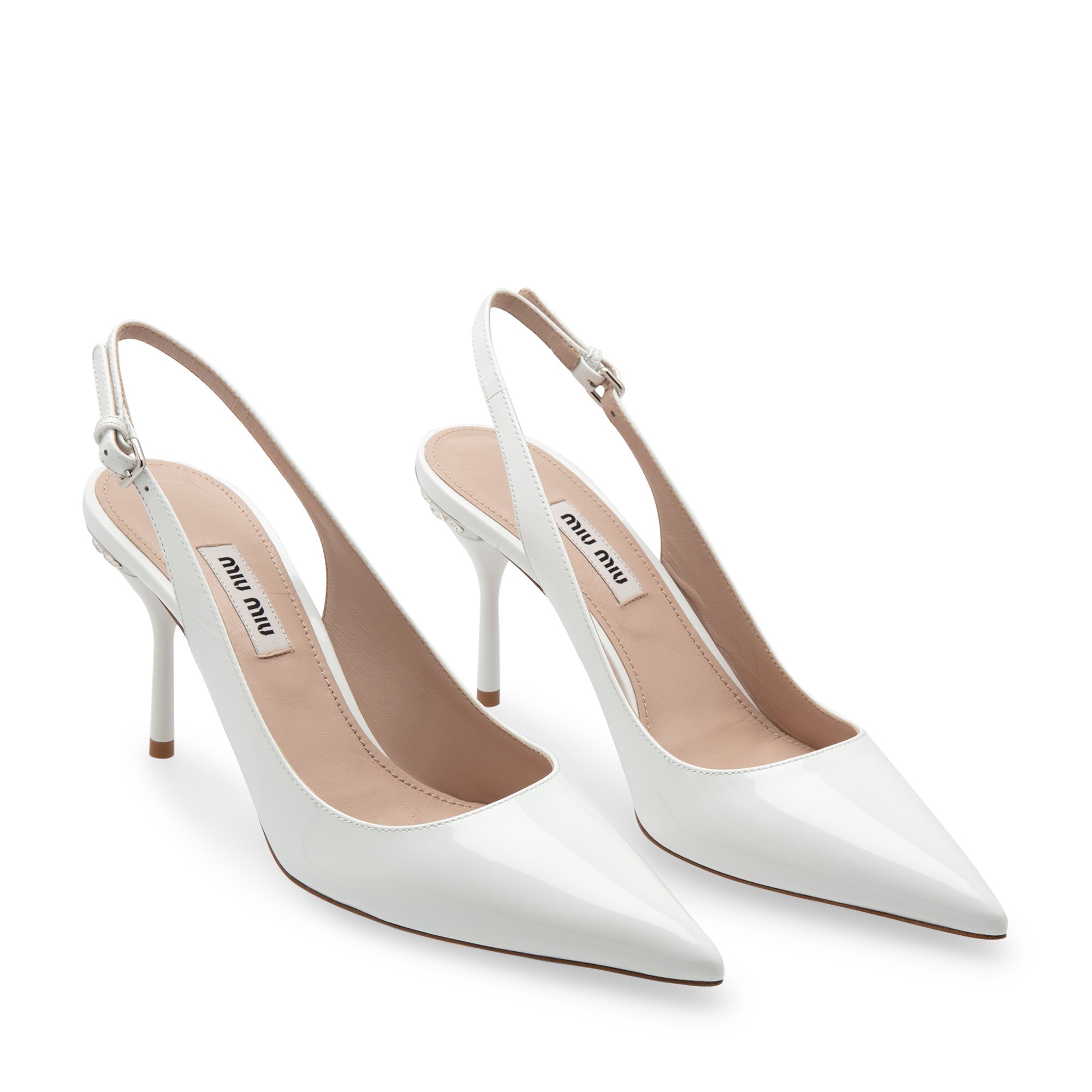 

Patent leather pumps, White