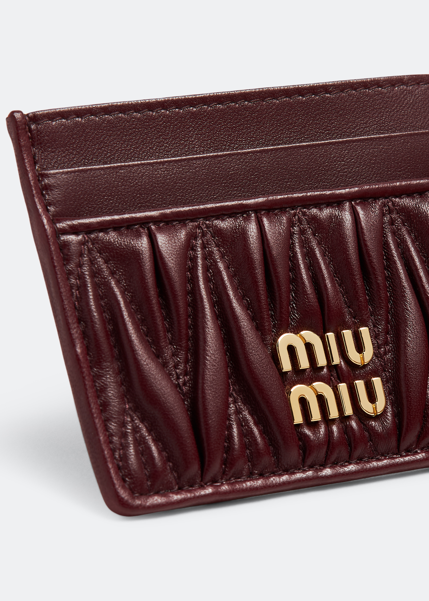 

Matelassé leather card holder, Burgundy