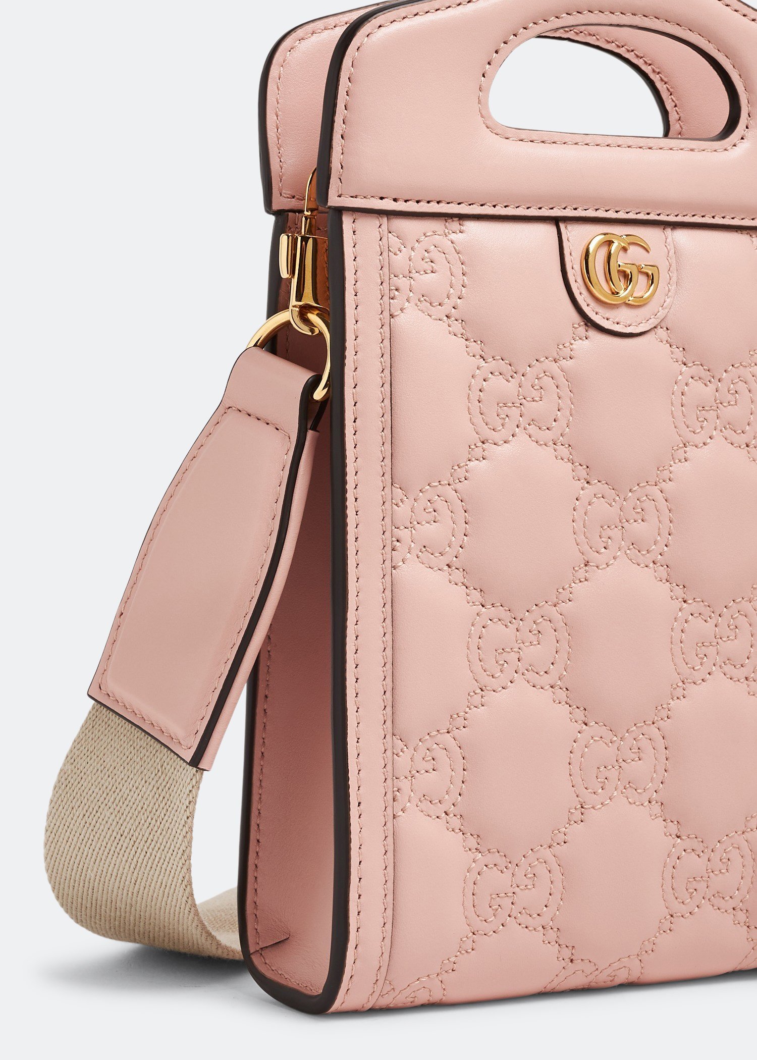 

GG matelassé top-handle mini bag, Pink