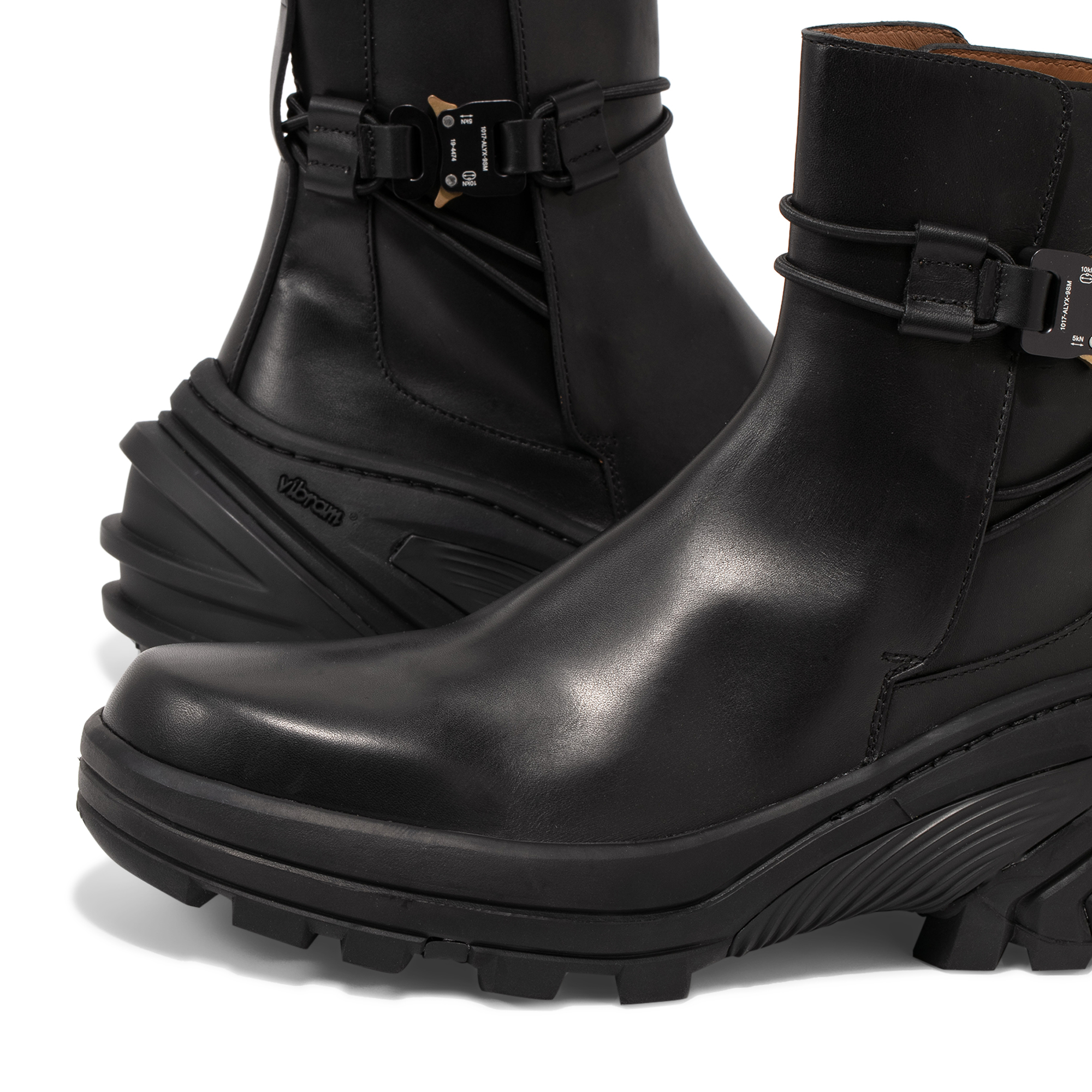 Rollercoaster-buckle leather and rubber boots, Black