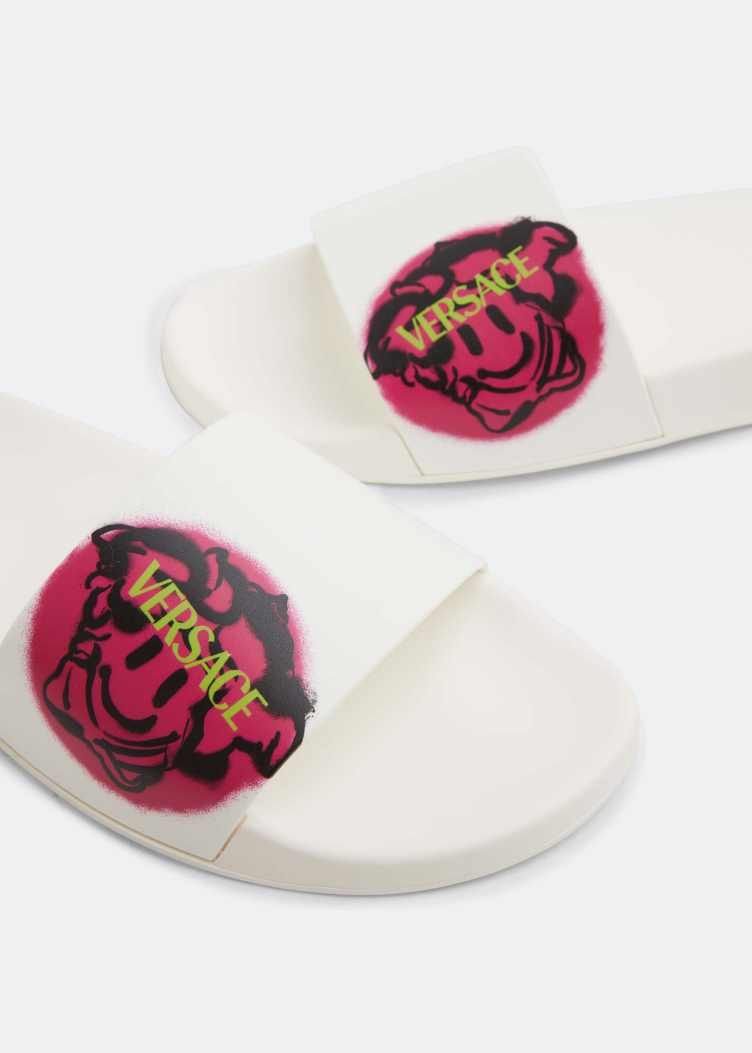 

Smiling Medusa slides, White