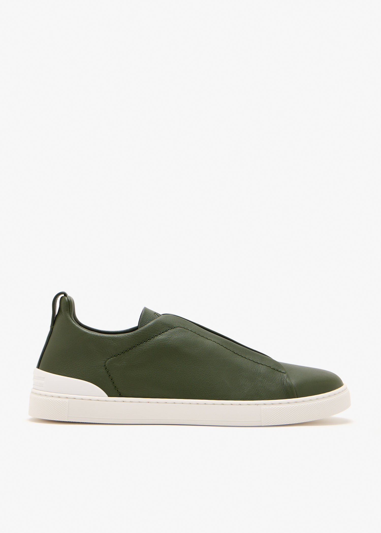

The pine green Triple Stitch™ SECONDSKIN leather sneakers offer exceptional comfort and flexibility.