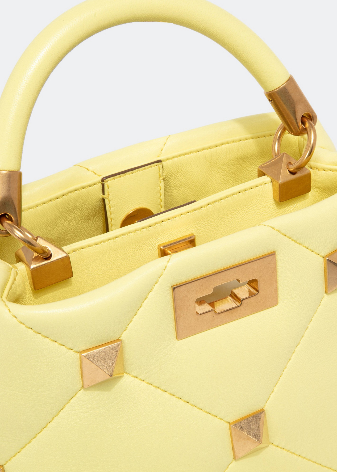 

Roman stud top handle bag, Yellow